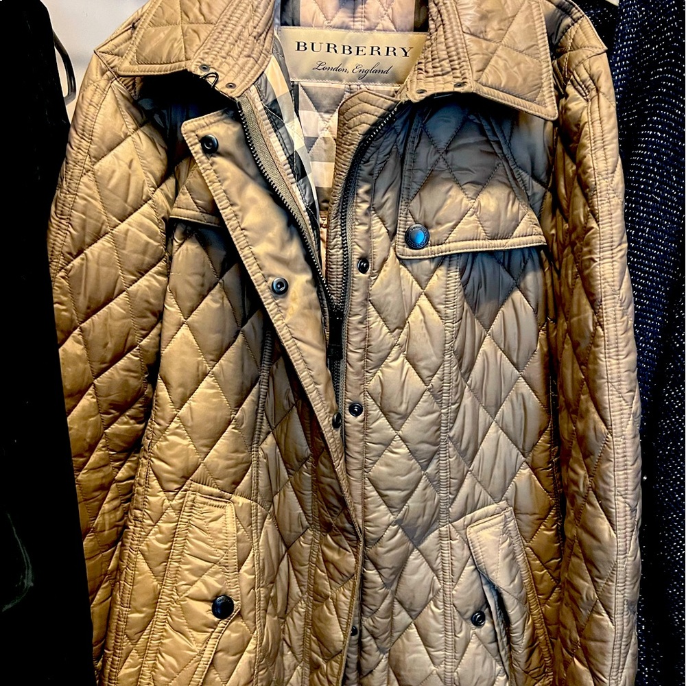 Brand new never worn authentic Burberry Jacket.